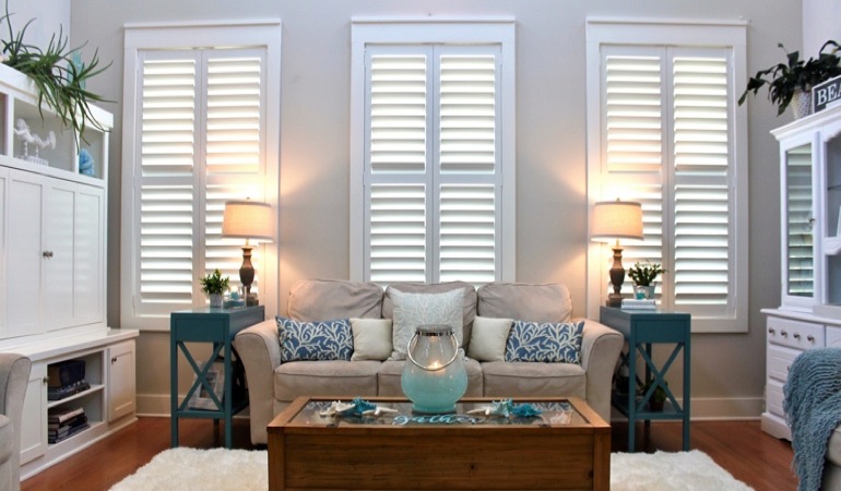 Raleigh designer sunroom with plantation shutters 